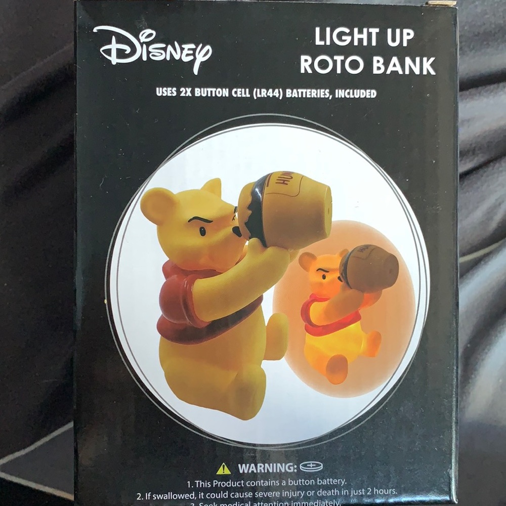 Disney Winnie the Pooh light up roto bank - new in box